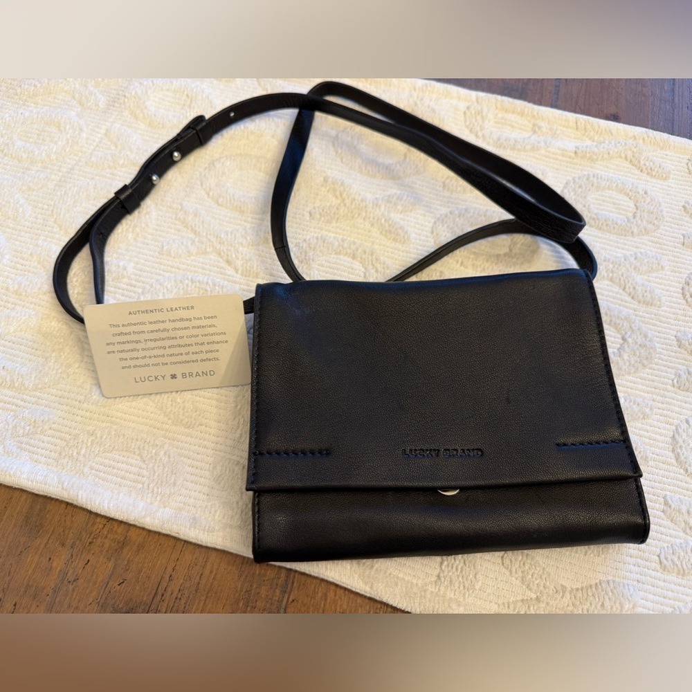 Lucky brand crossbody flap black NWOT Never been used.